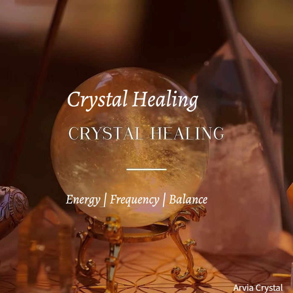 A golden crystal sphere glows softly in warm light, symbolizing the healing frequencies and balance of crystal energy